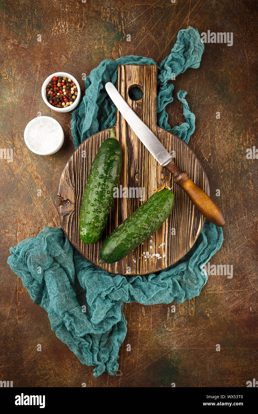 Fresh cucumber on wooden board Stock Photo