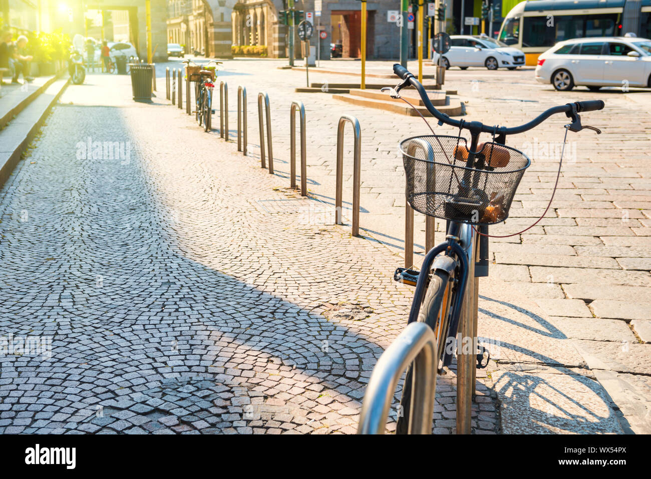 Bicycle parked on city street Stock Photo