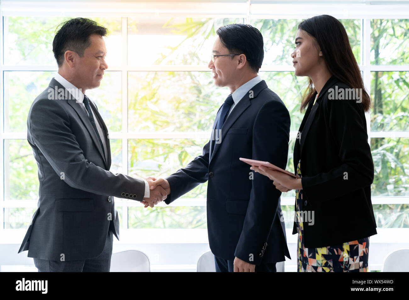 Business deal in a cafe Stock Photo