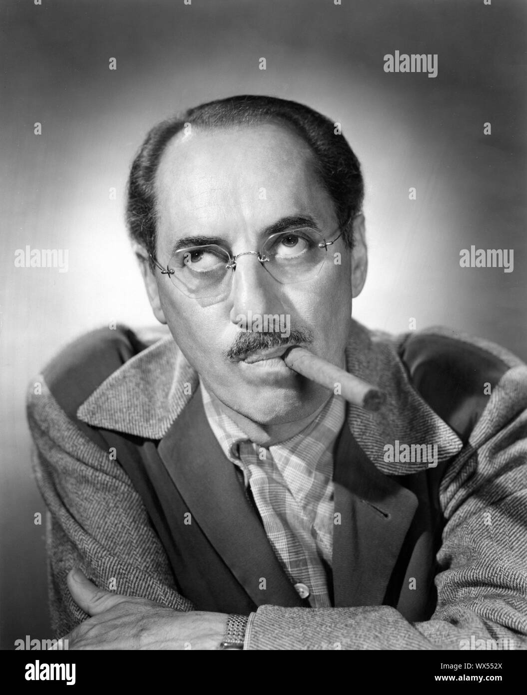 GROUCHO MARX 1951 Portrait by Elmer W. Holloway Publicity for TV Series YOU BET YOUR LIFE NBC / National Broadcasting Corporation Stock Photo