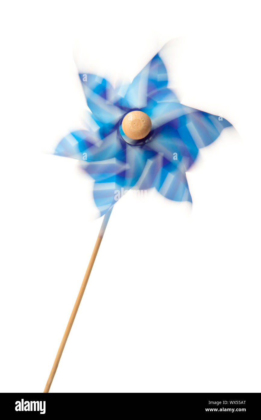 Pinwheel in motion against a white background Stock Photo - Alamy