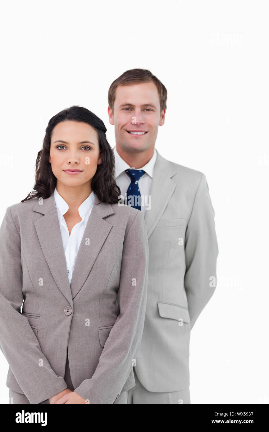 Businesspeople standing together against a white background Stock Photo