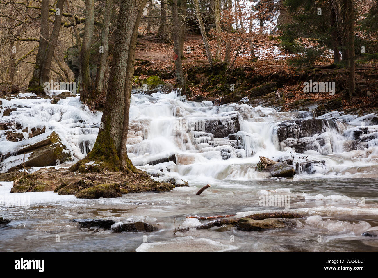 Pictures of the Selke waterfall in winter Harz Stock Photo