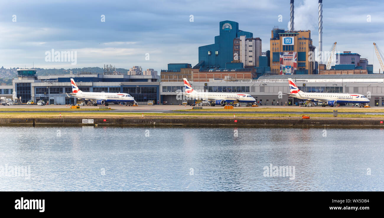 London, United Kingdom – July 8, 2019: British Airways BA CityFlyer Embraer 190 airplanes at London City Airport (LCY) in the United Kingdom. Stock Photo