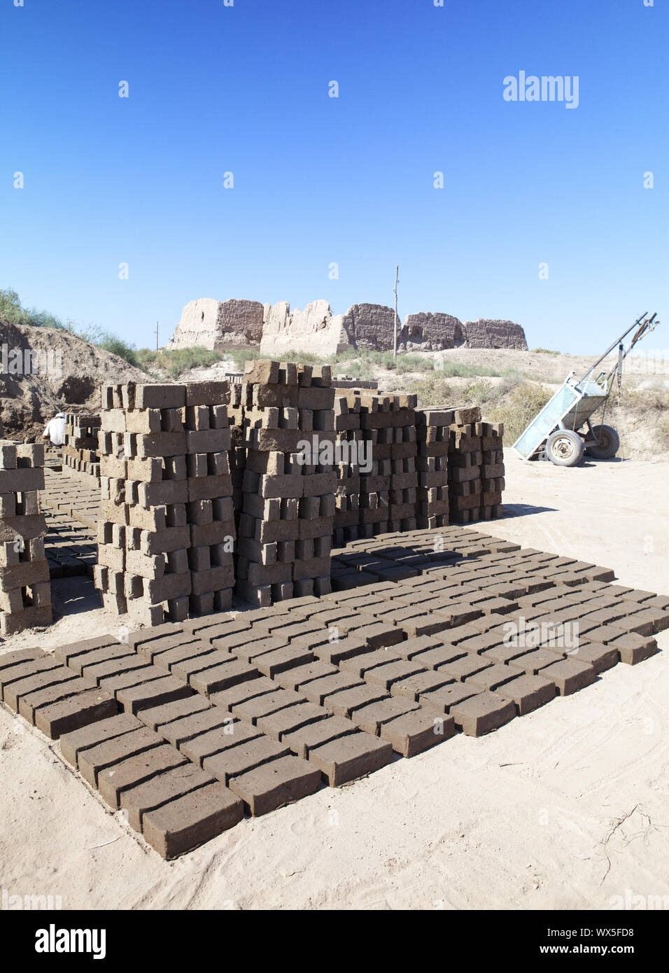 repair of ancient fortress Kyzyl-kala in Kyzylkum Desert, Uzbekistan Stock Photo