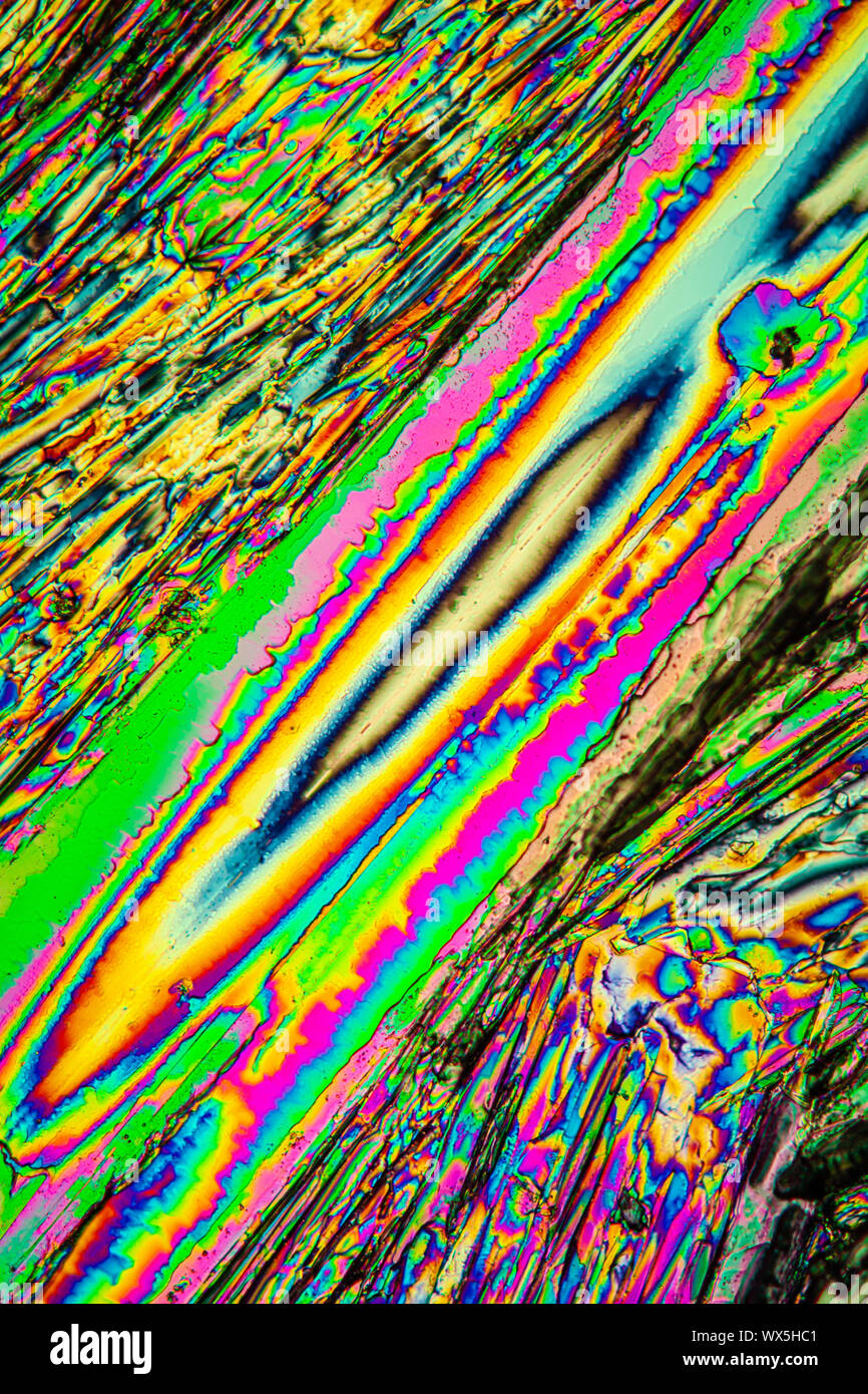 Urea crystals in polarized light under the microscope Stock Photo