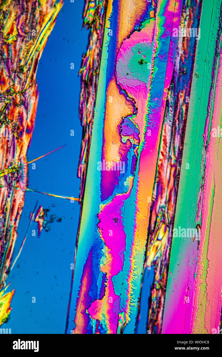 Urea crystals in polarized light under the microscope Stock Photo