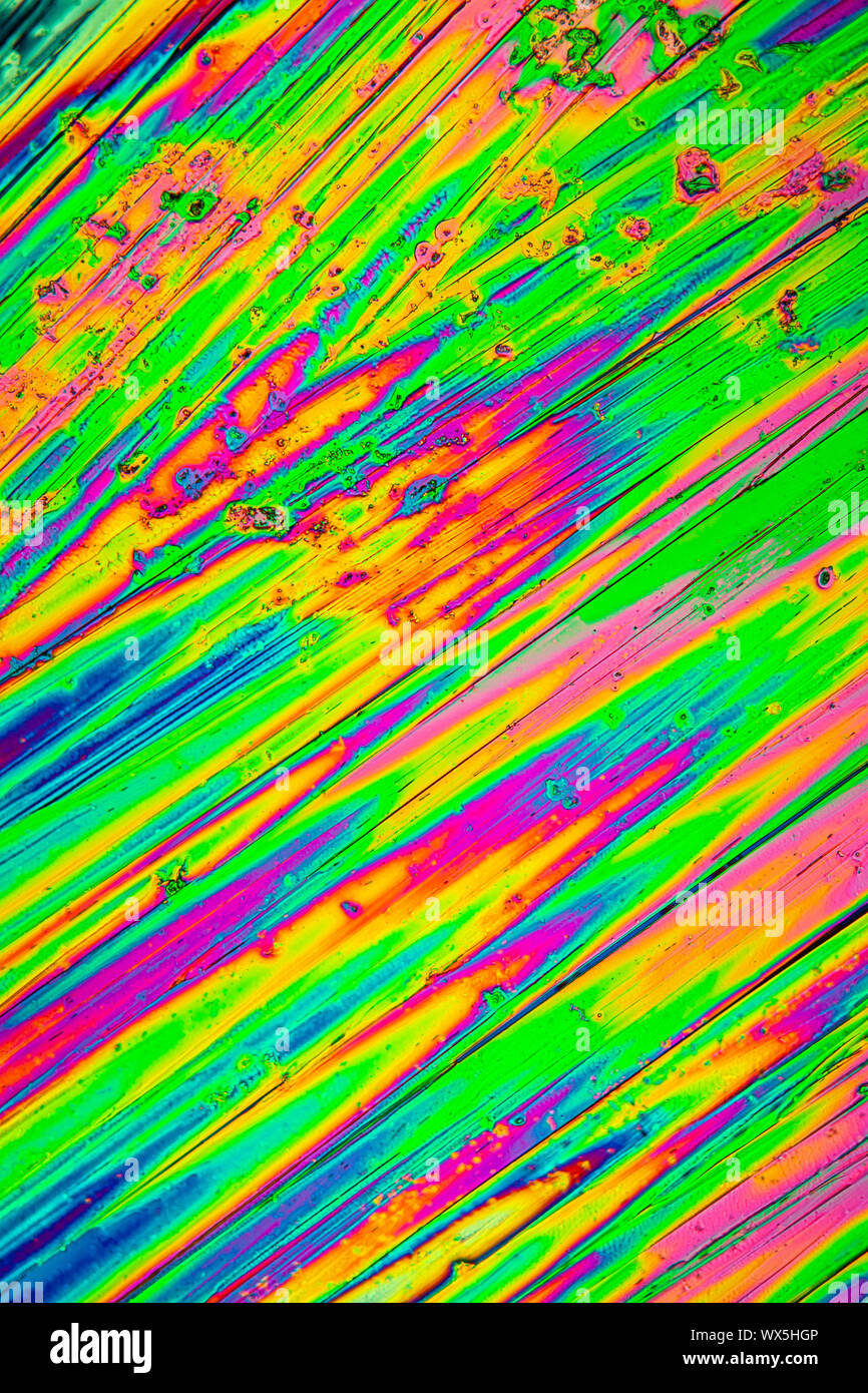 Urea crystals in polarized light under the microscope Stock Photo