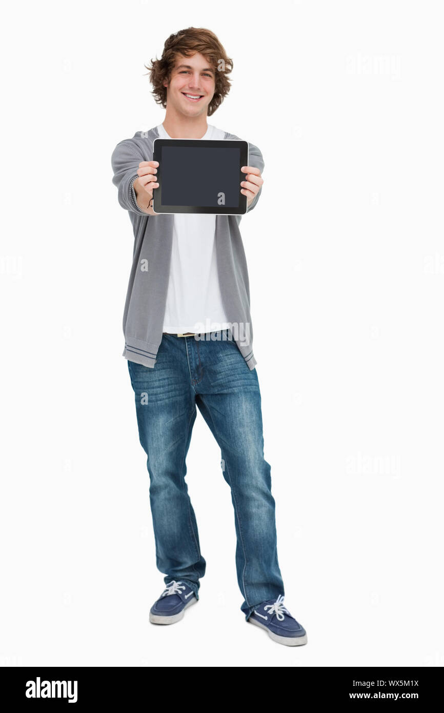 Student Using Touch Screen Male student showing a touch pad screen against white background Stock ...