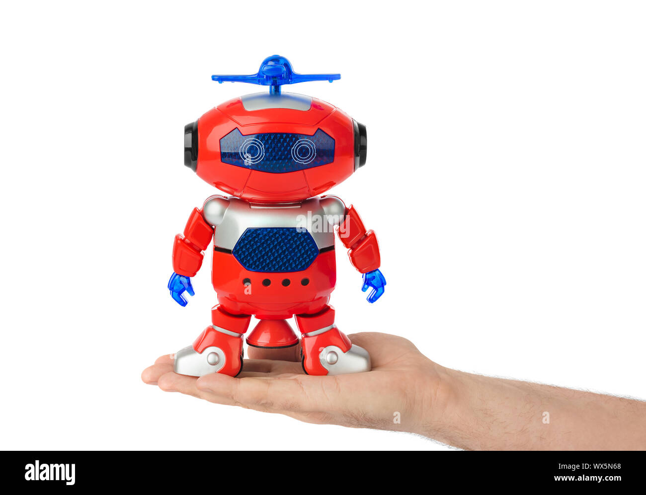 Hand with toy robot Stock Photo