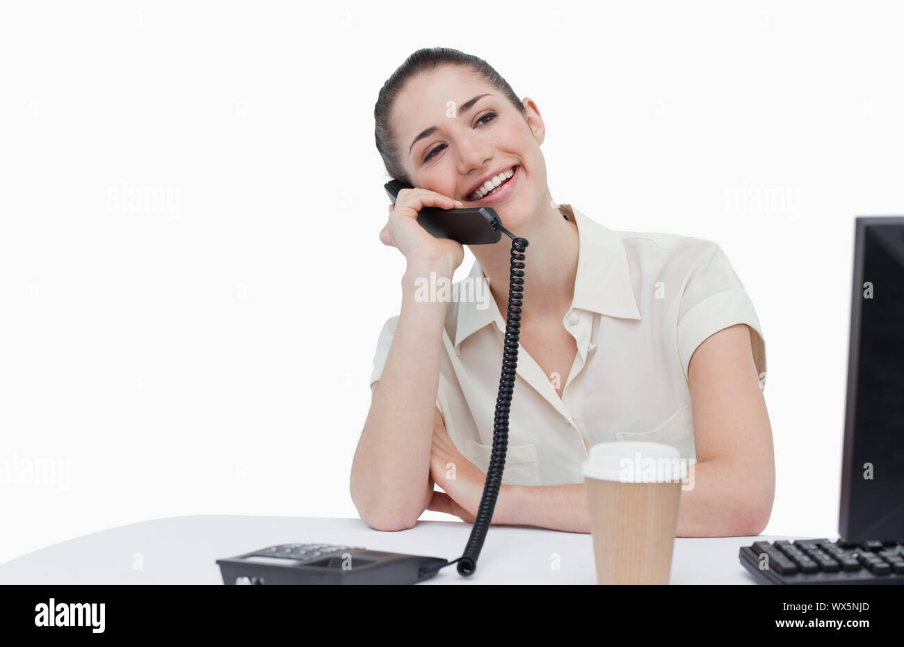 Laughing secretary answering the phone Stock Photo - Alamy