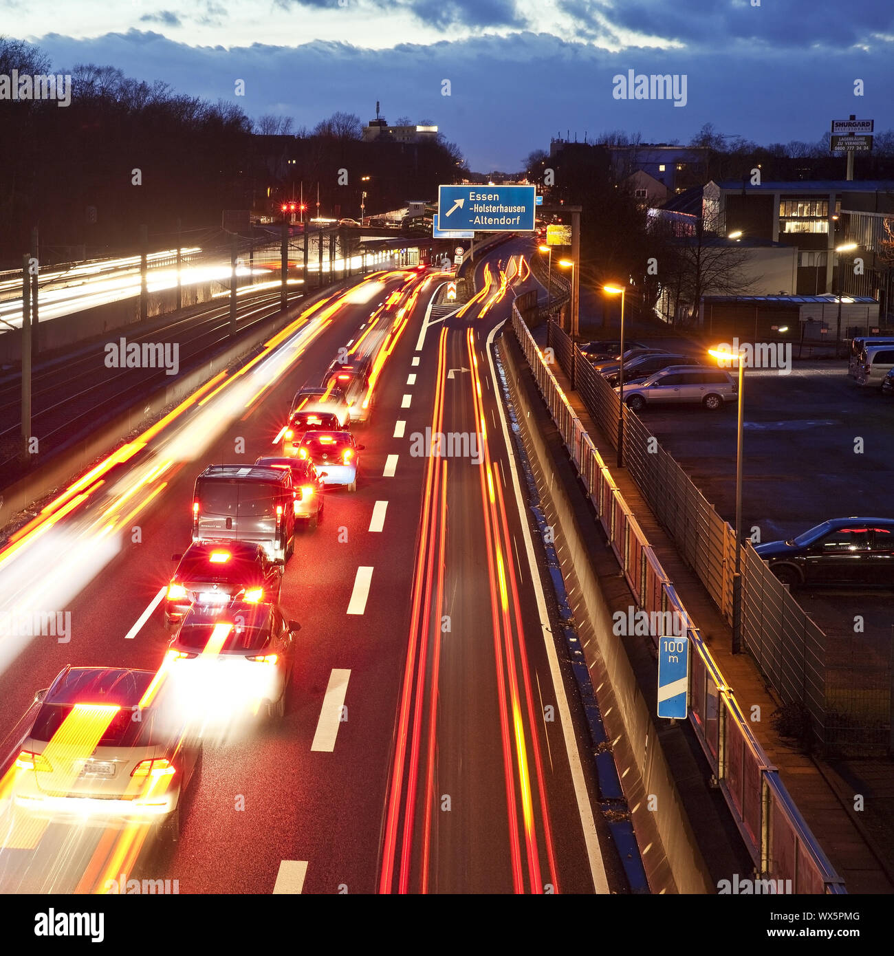traffic on motorway A40 in the evening, Essen, Ruhr Area, North Rhine-Westphalia, Germany, Europe Stock Photo