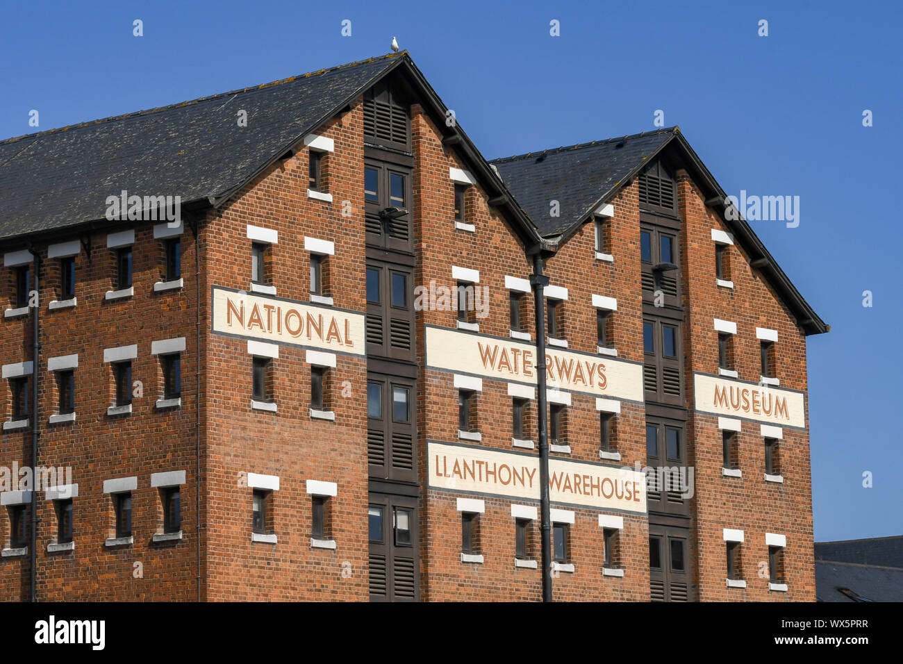 GLOUCESTER QUAYS, ENGLAND - SEPTEMBER 2019: Exterior view of the National Waterways Museum, in the old Llanthony Warehouse in Gloucester Quays Stock Photo
