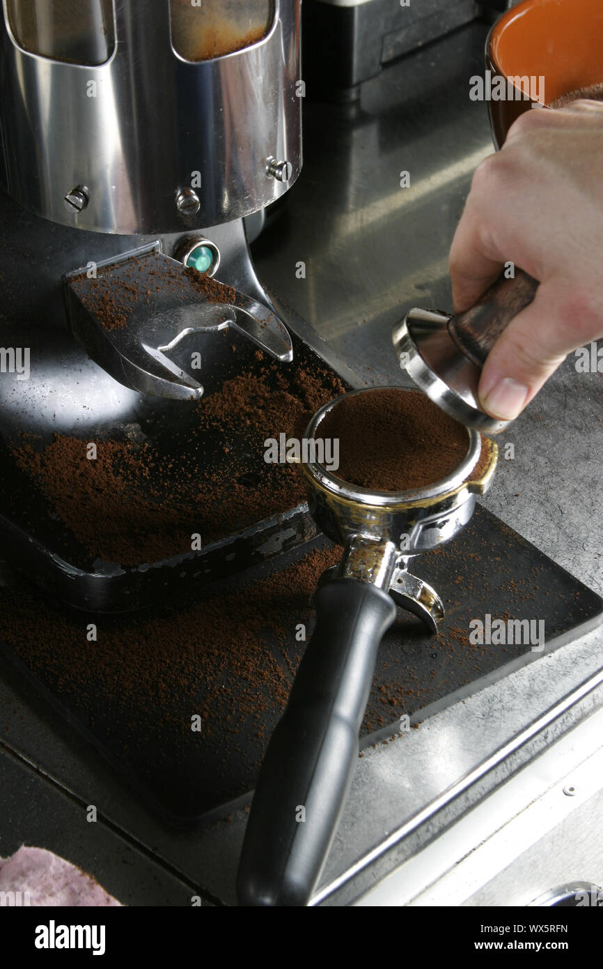 Tamping Espresso Grounds Stock Photo