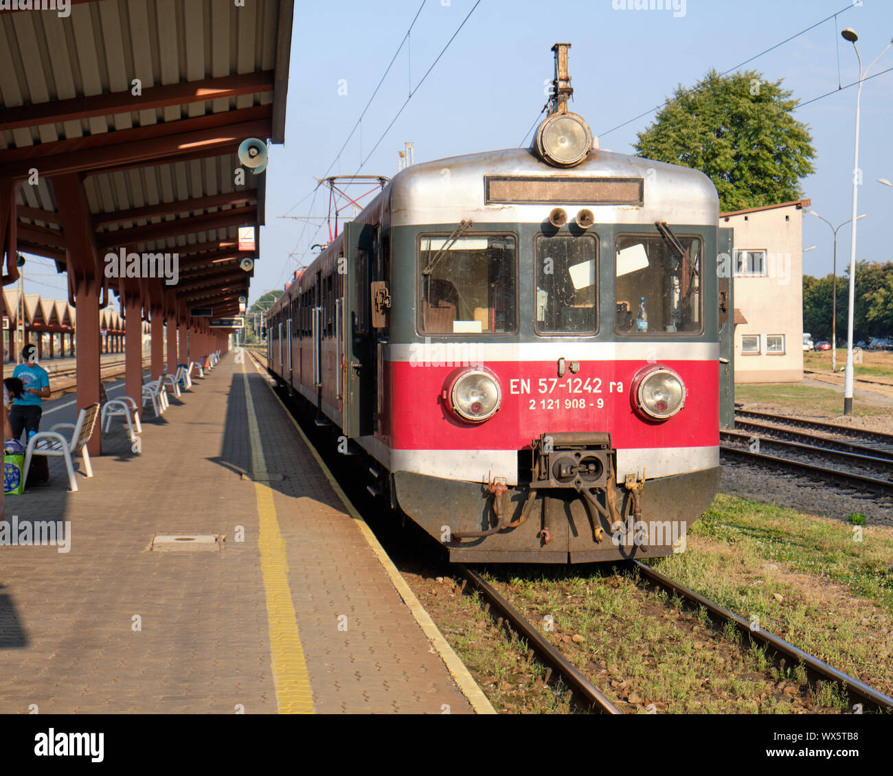 Przemysl, Poland, August 31, 2019.  EN57 Engine Polish regional train at station platform awaiting departure in late afternoon Stock Photo
