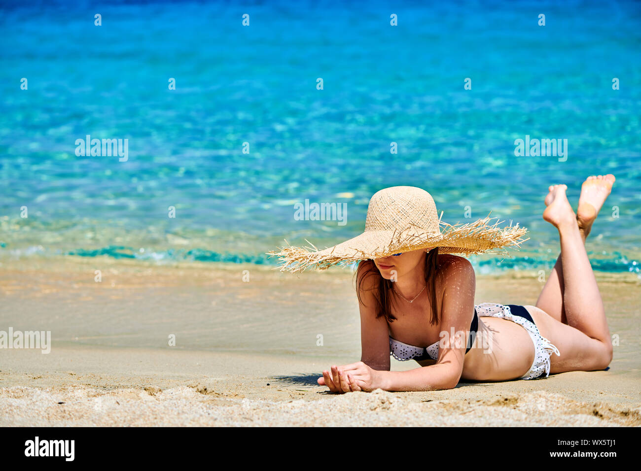 Woman in bikini on beach Stock Photo Alamy