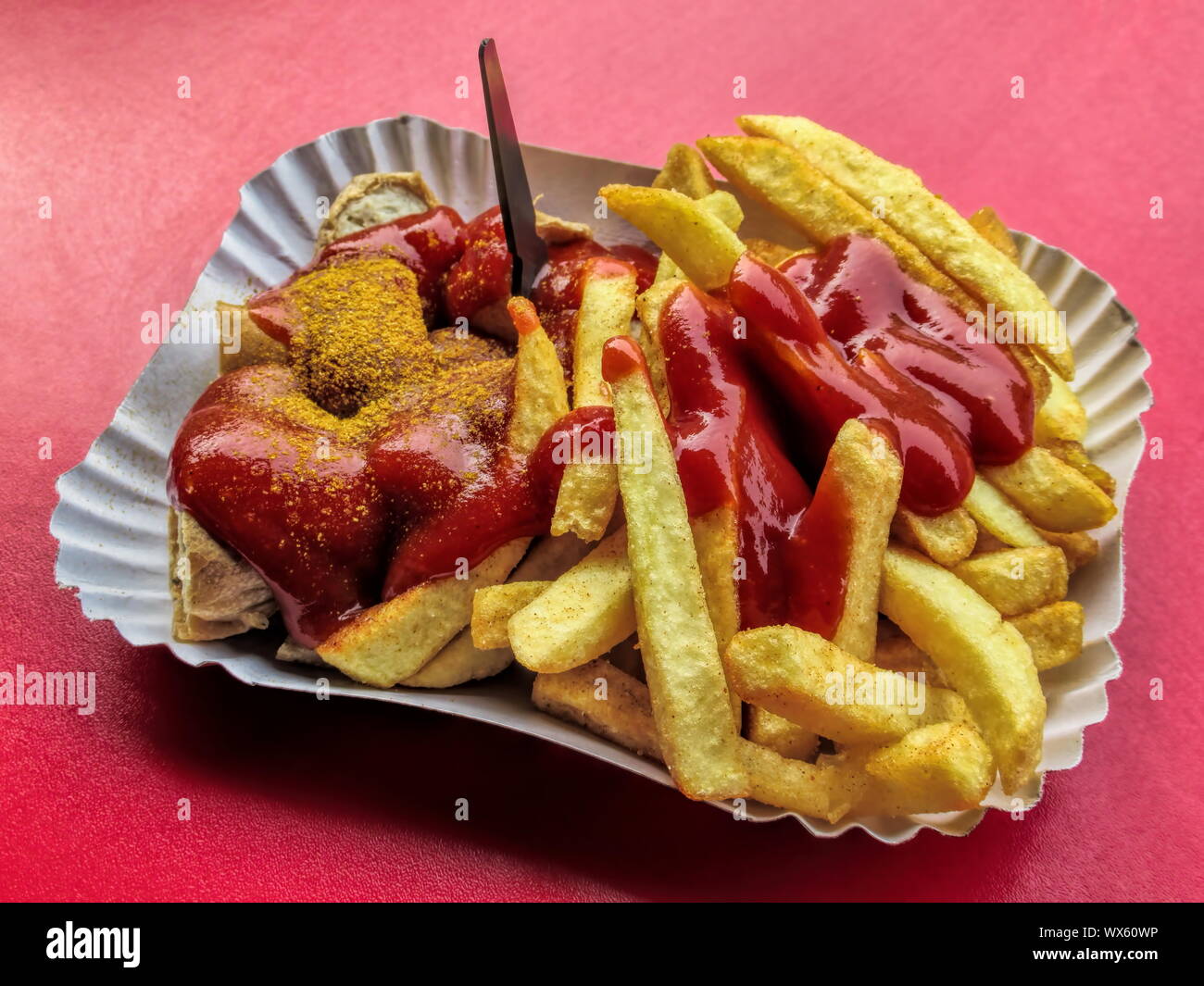 Currywurst with French fries Stock Photo