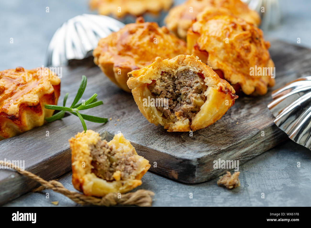 Homemade mini-pies with meat filling. Stock Photo