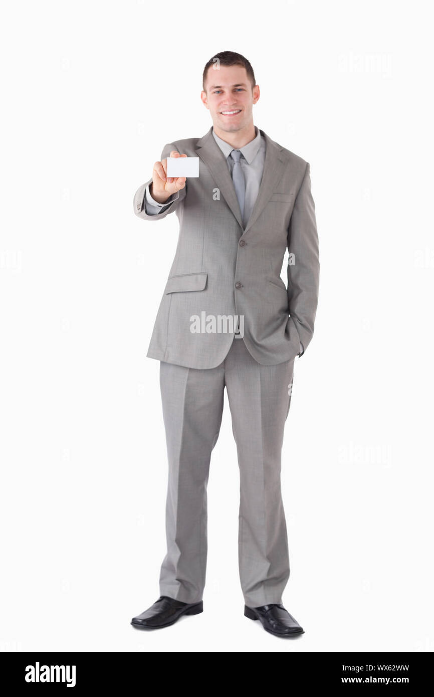 Portrait of a smiling businessman showing a business card against a white background Stock Photo ...