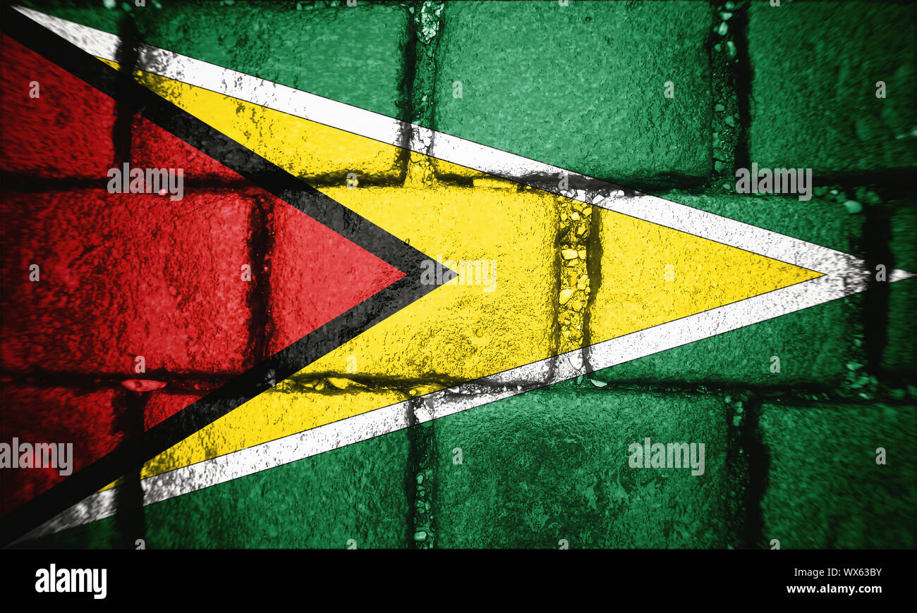 National flag of Guyana made from colored smoke isolated on black background.  Abstract silky wave background. Stock Photo | Adobe Stock