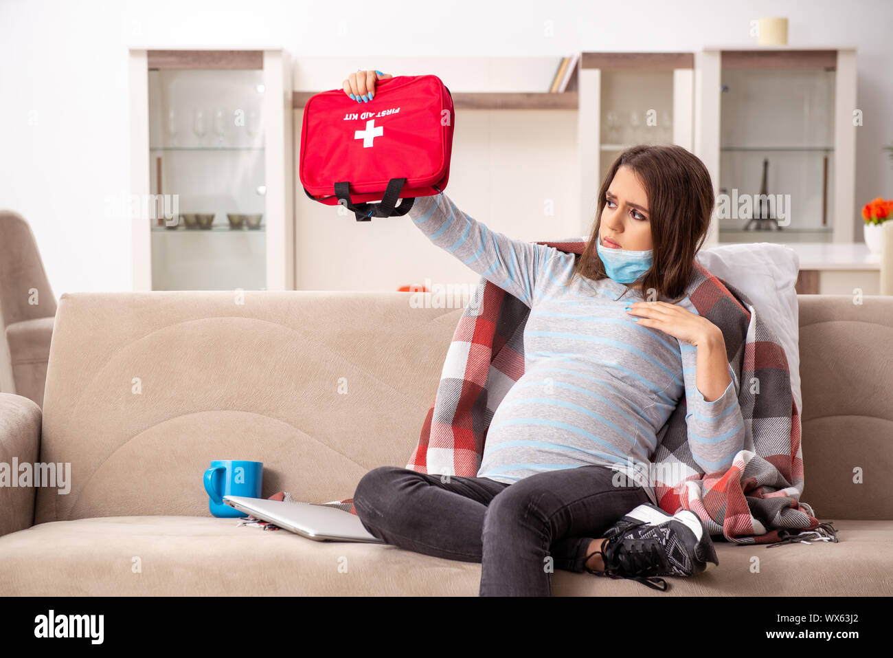 Sick pregnant woman suffering at home Stock Photo Alamy