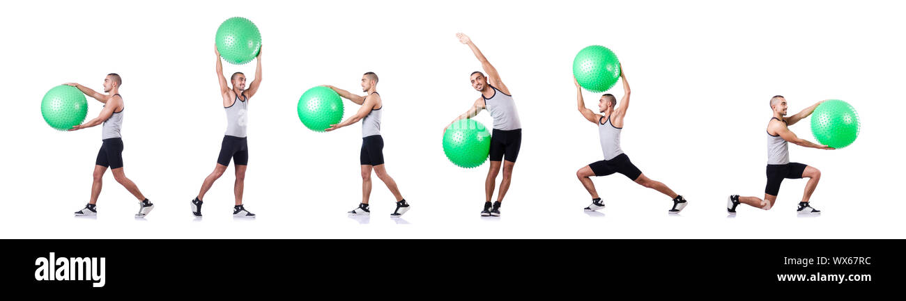 Man with swiss ball doing exercises on white Stock Photo - Alamy