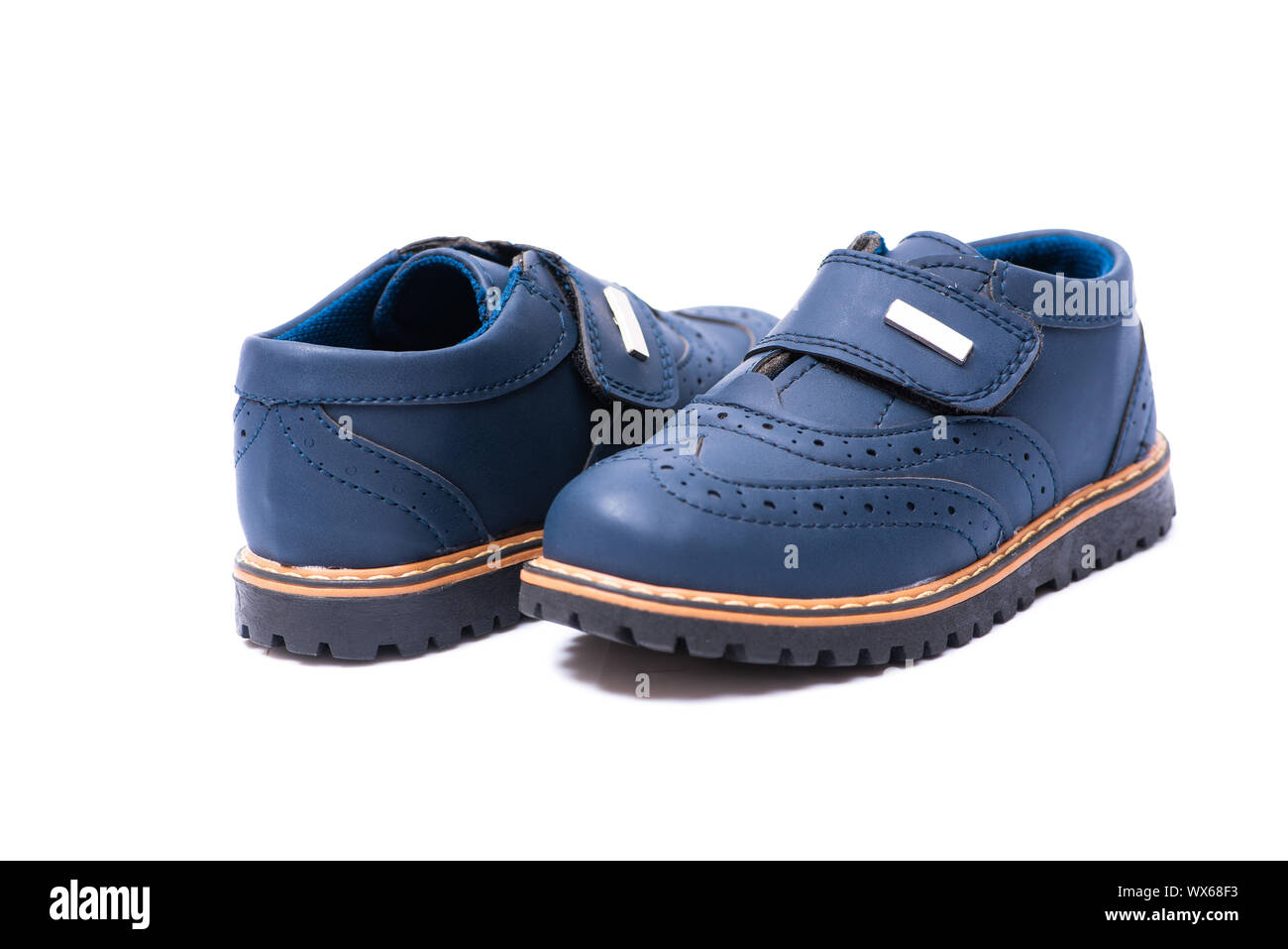 Blue baby shoes isolated on white background Stock Photo - Alamy