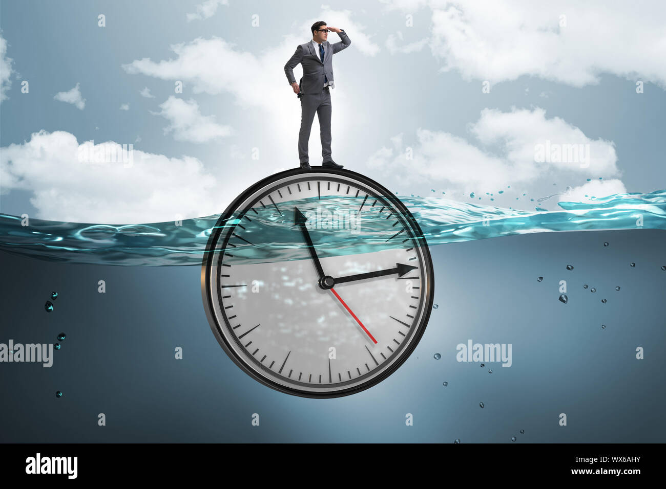 Businessman in deadline and time management concept Stock Photo