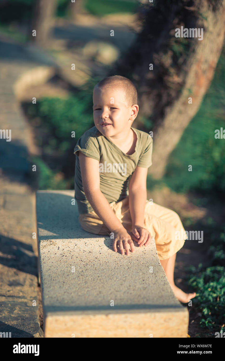Outdoor portrait of cute little boy Stock Photo - Alamy