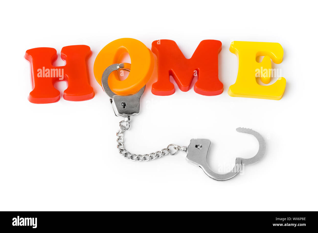Home and handcuffs Stock Photo