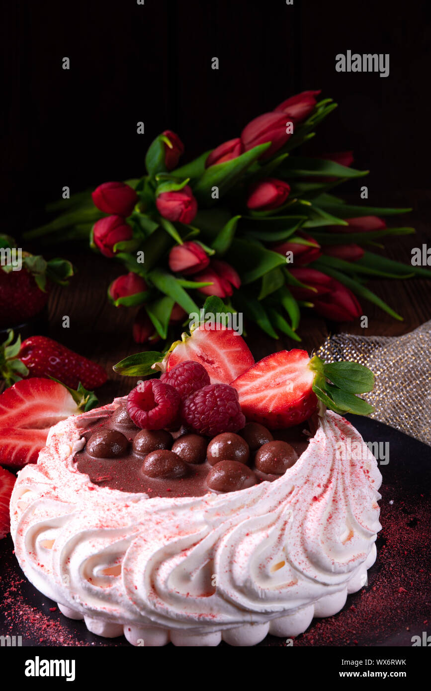light pavlova with fresh fruits and chocolate Stock Photo