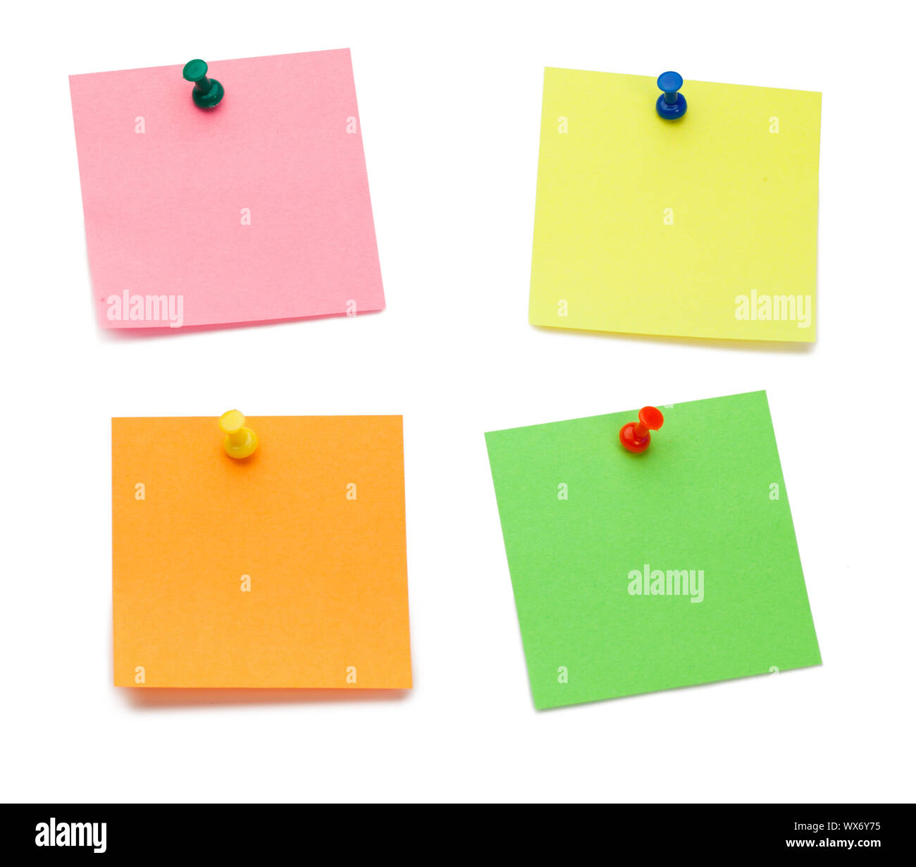 Color postits with drawing pins on a white background Stock Photo Alamy
