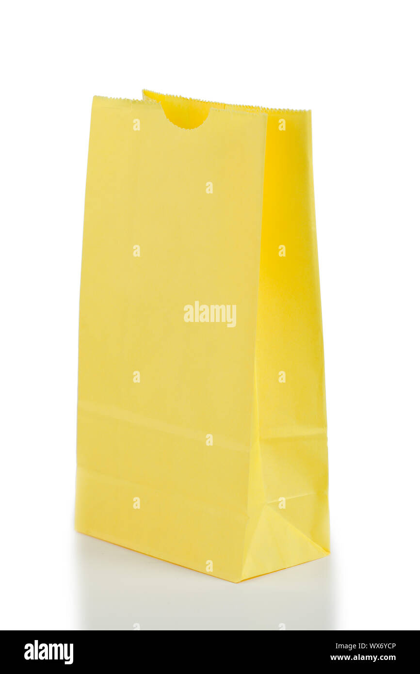 Yellow paper bag on a white background Stock Photo Alamy