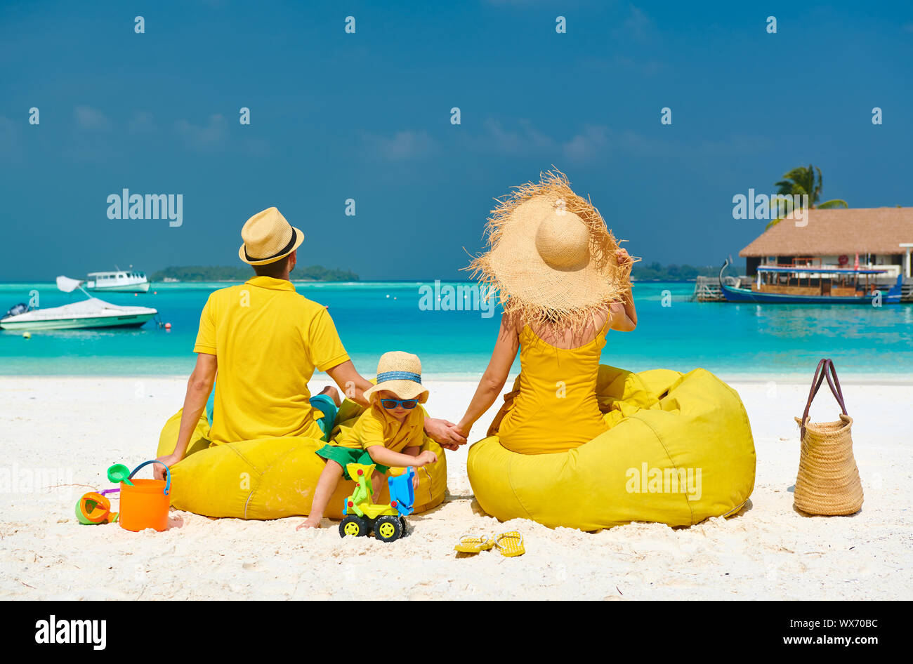 Family With Three Year Old Boy On Beach Stock Photo Alamy
