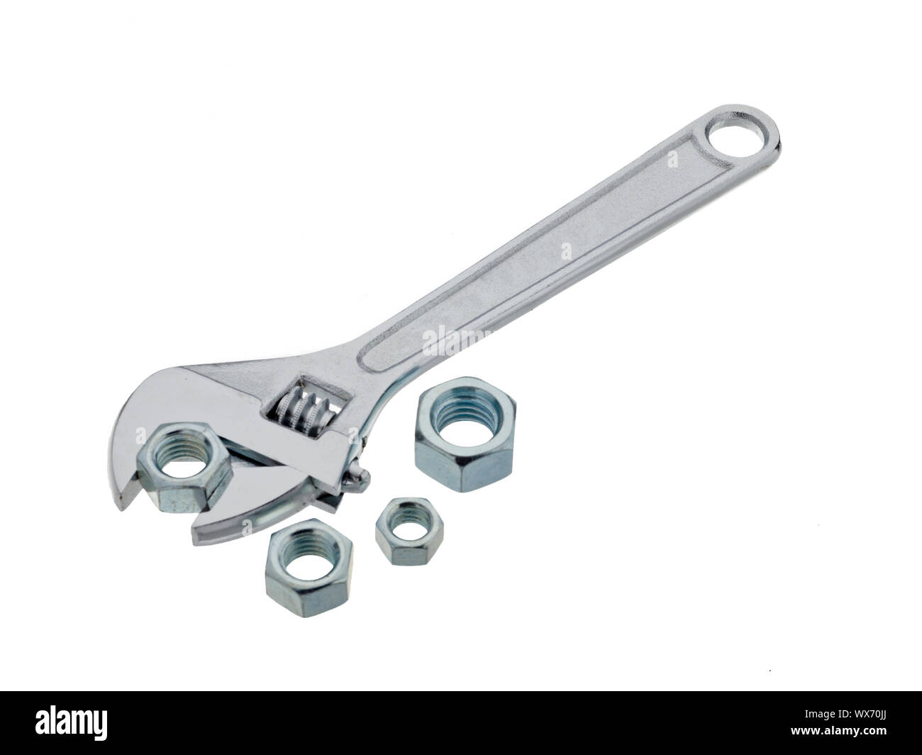 A wrench gripping a nut Stock Photo Alamy
