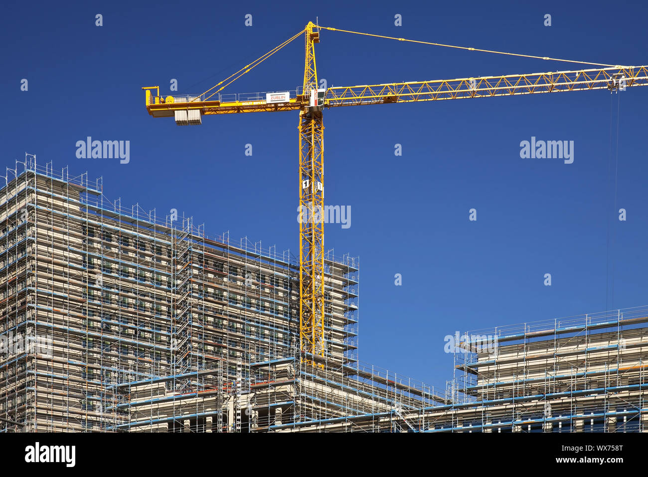construction cranes on construction site Messe-City, Cologne, Rhineland, Germany, Europe Stock Photo