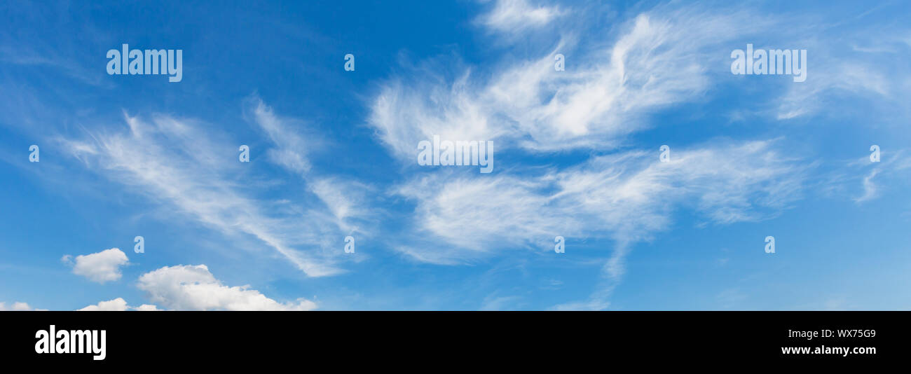 Blue sky background with clouds Stock Photo - Alamy