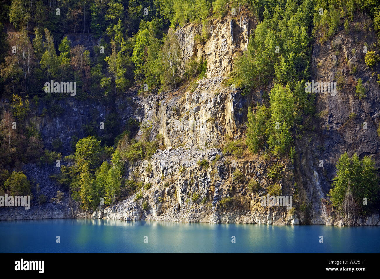 Prangenhaus limestone quarry, rock wall and lake, Wuelfrath, North