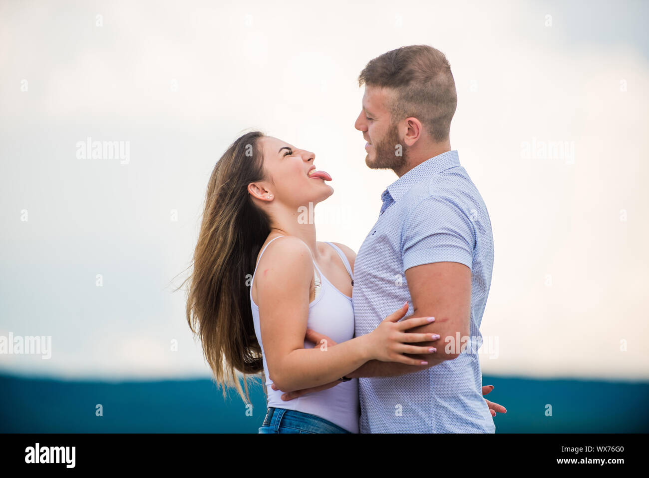 Honeymoon concept. Romantic relations. True love. Family love. Couple in love. Supporting her. Cute relationship. Man and woman cuddle nature background. Together forever. Love story. Just married. Stock Photo