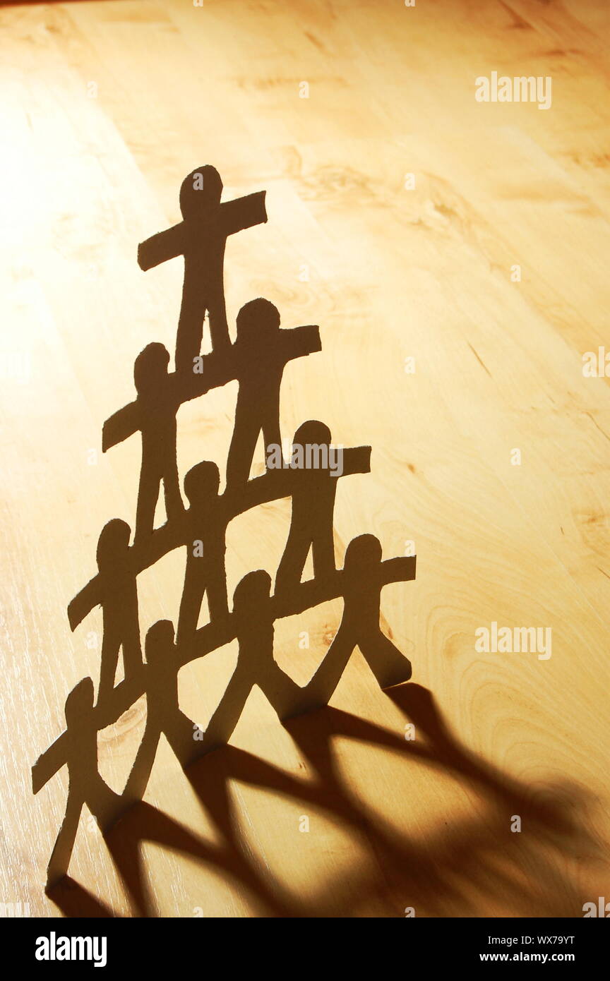 team of paper people showing concept of teamwork Stock Photo Alamy