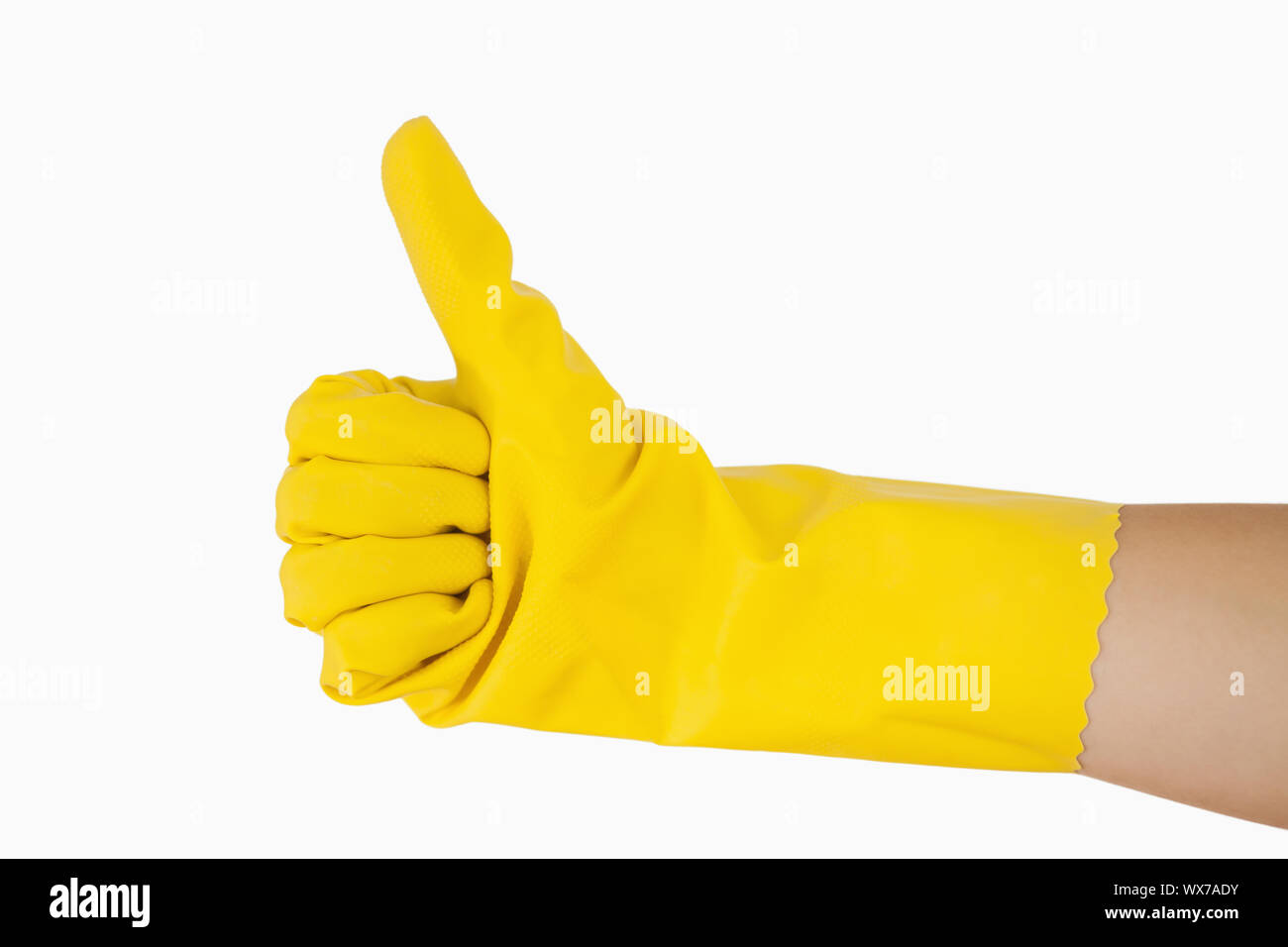 Female hand in glove giving the thumbs up Stock Photo - Alamy