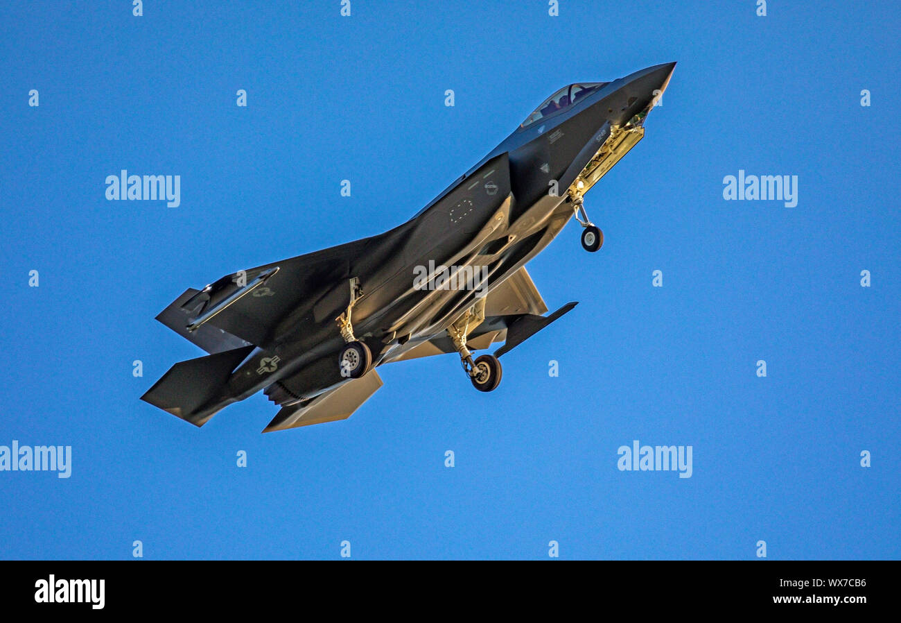 Is this shot a Lockheed Martin F-35A Lightning II jet fighter performs training exercises over Layton, Utah near Hill Air Force Base, Utah, USA. Stock Photo