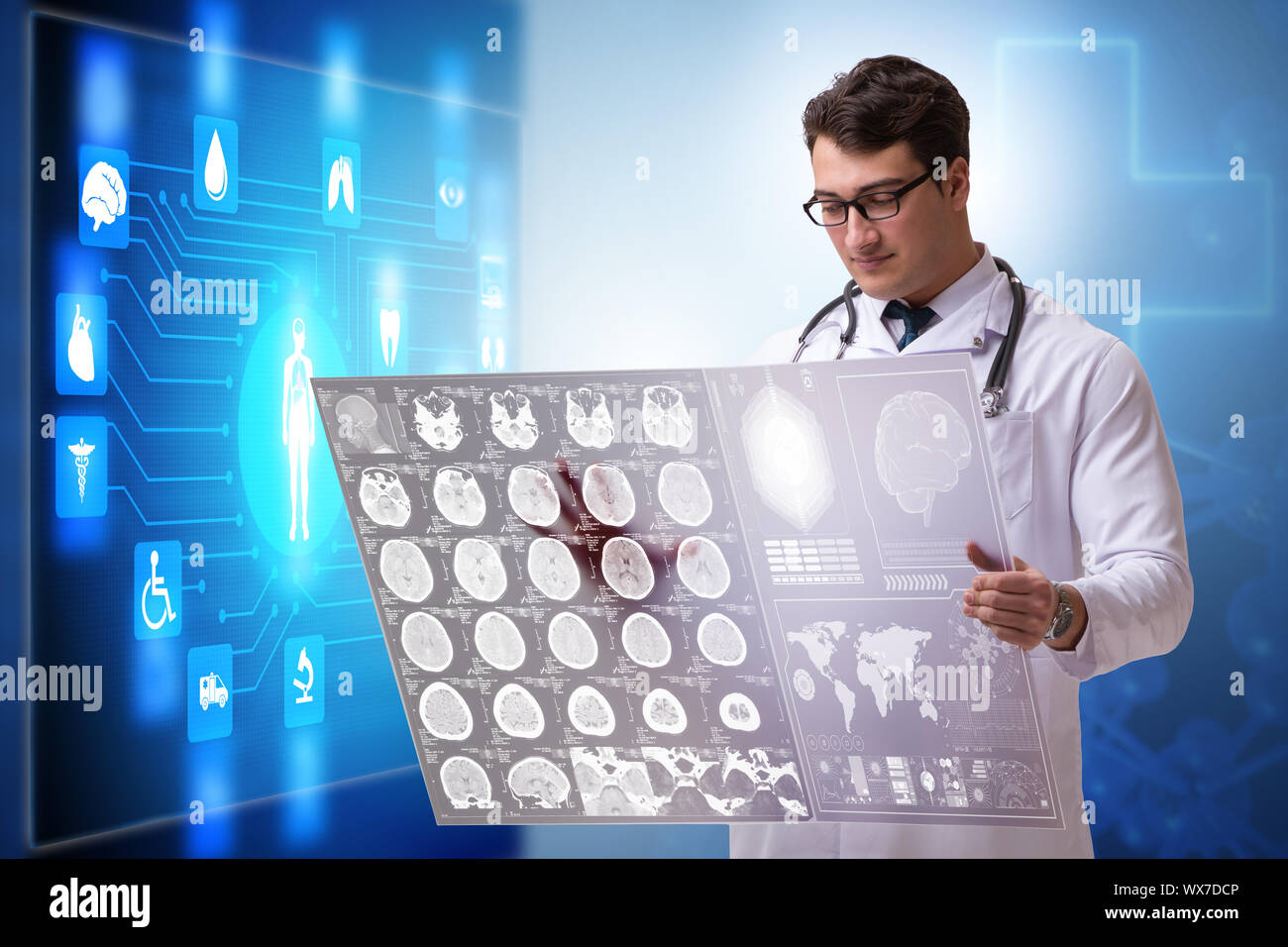 Doctor in telemedicine concept looking at x-ray image Stock Photo