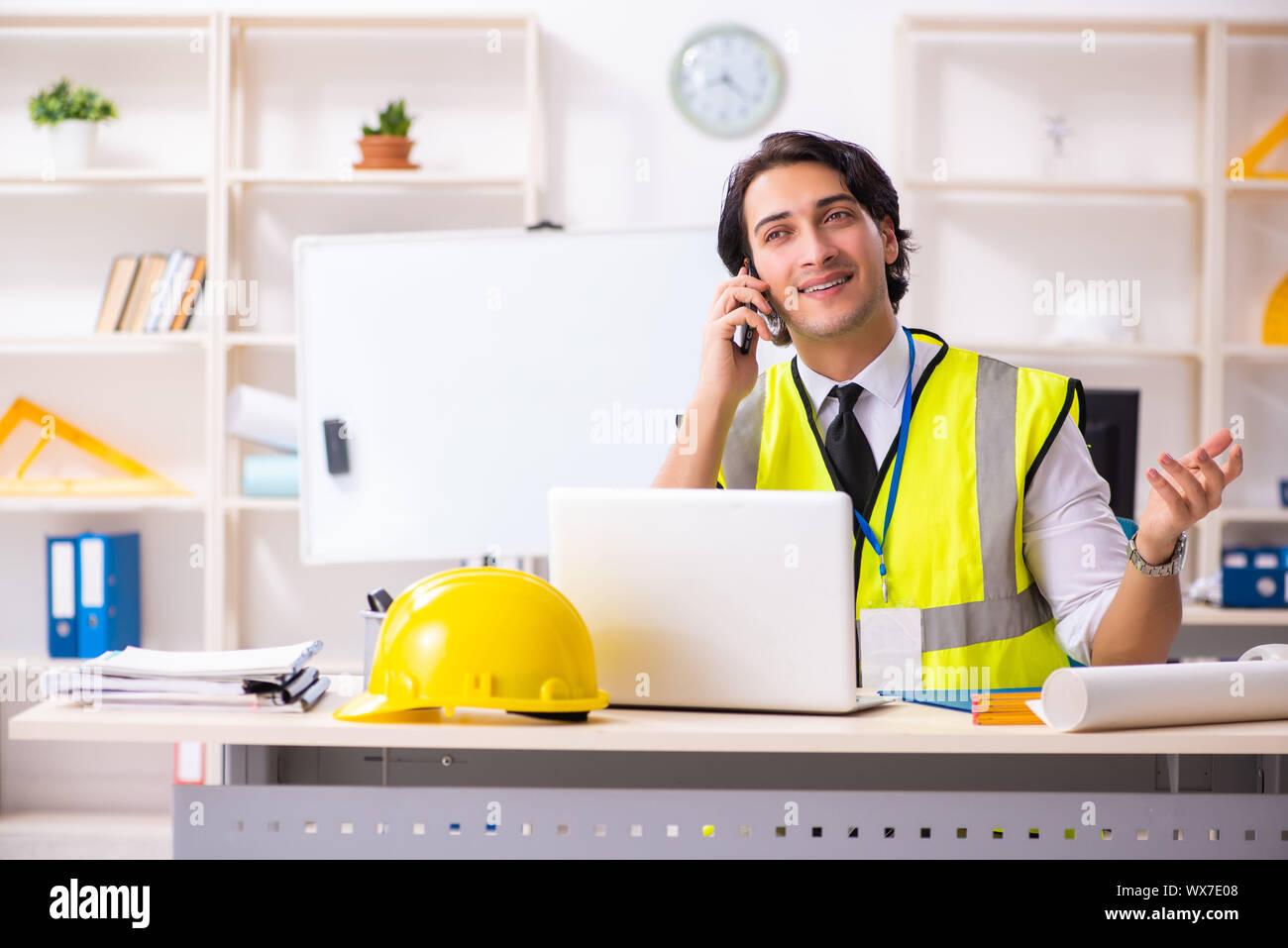 Male construction engineer working in the office Stock Photo - Alamy