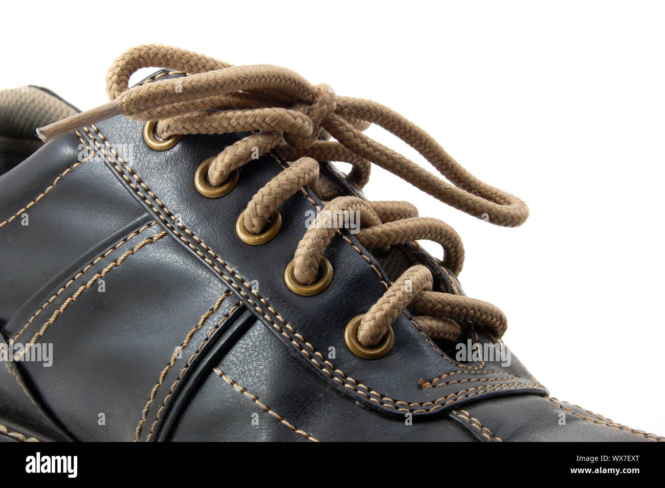 macro of a brown leather shoe and bootlace Stock Photo
