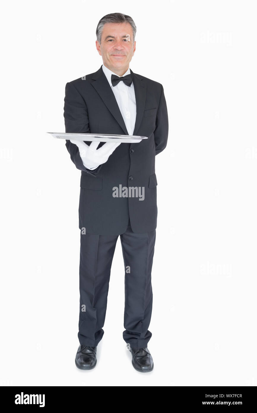 Waiter holding tray high hi-res stock photography and images - Alamy