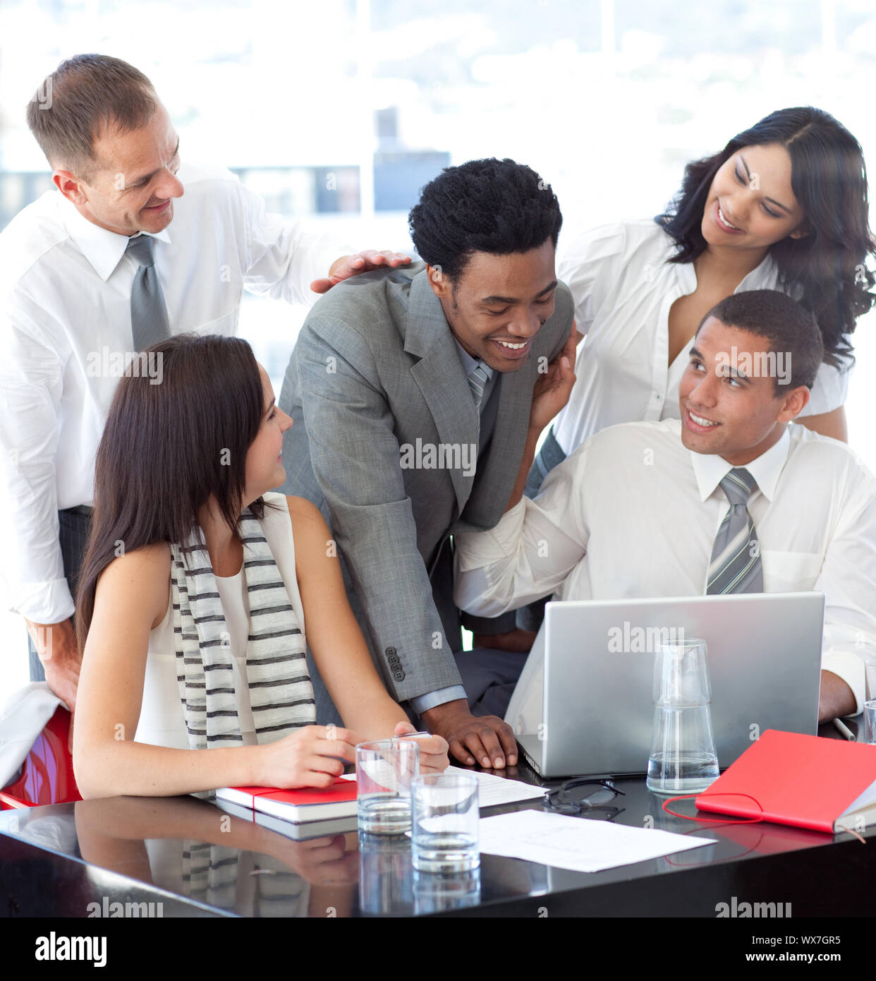 Successful multi-ethnic business team working together in office Stock ...