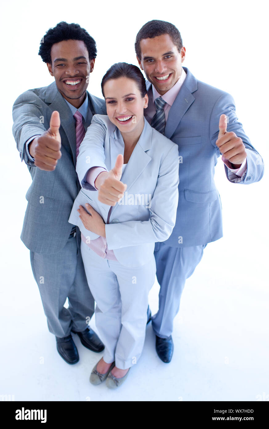 High angle of happy business team with thumbs up Stock Photo - Alamy