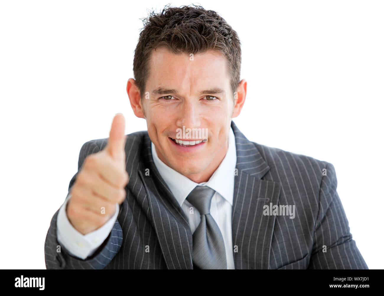 Happy businessman with a thumb up against a white background Stock ...