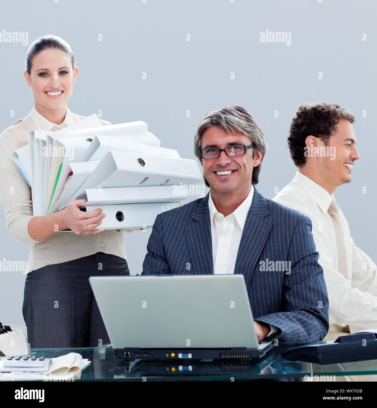Portrait of an ambitious business team at work in the office Stock ...